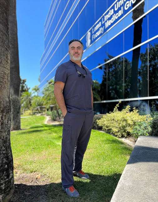 Doctor in front of building